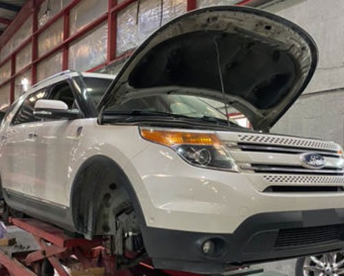 Ford Repair Dubai expert technician working on Ford engine